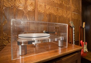 Acrylic Turntable, Wall Coverings, and Guitars